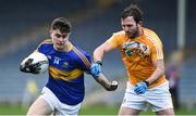 5 February 2017; Michael Quinlivan of Tipperary in action against Patrick Gallagher of Antrim during the Allianz Football League Division 3 Round 1 match between Tipperary and Antrim at Semple Stadium in Thurles, Co. Tipperary. Photo by Matt Browne/Sportsfile