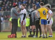 5 February 2017; Tyrone doctor Damian O'Donnell checks Niall Sludden of Tyrone for concussion during the Allianz Football League Division 1 Round 1 match between Tyrone and Roscommon at Healy Park in Omagh, Co. Tyrone. Photo by Oliver McVeigh/Sportsfile