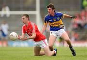 3 July 2011; Tadhg Brosnan, Cork, in action against Greg Henry, Tipperary. Munster GAA Football Minor Championship Final, Cork v Tipperary, Fitzgerald Stadium, Killarney, Co. Kerry. Picture credit: Brendan Moran / SPORTSFILE