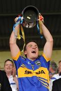 3 July 2011; Tipperary captain Liam McGrath lift the cup. Munster GAA Football Minor Championship Final, Cork v Tipperary, Fitzgerald Stadium, Killarney, Co. Kerry. Picture credit: Stephen McCarthy / SPORTSFILE