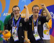 3 July 2011; Team Ireland's Oliver Magee, Lisburn, Co. Antrim, left, and Conor Ryan, Kilkenny, Co. Kilkenny, who  were presented with 5th place ribbons at the Bocce Finals at the SEF Sport Training Halls, Peace & Friendship Stadium. 2011 Special Olympics World Summer Games, Athens, Greece. Picture credit: Ray McManus / SPORTSFILE