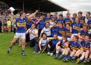3 July 2011; Tipperary captain Liam McGrath celebrates with his team-mates after the game. Munster GAA Football Minor Championship Final, Cork v Tipperary, Fitzgerald Stadium, Killarney, Co. Kerry. Picture credit: Brendan Moran / SPORTSFILE