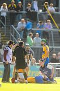 2 July 2011; Clare physiotherapist Shane O Regan attends to an injury during the game. GAA Hurling All-Ireland Senior Championship, Phase 2, Galway v Clare, Pearse Stadium, Galway. Picture credit: Stephen McCarthy / SPORTSFILE
