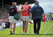 3 July 2011; Ciarán Sheehan, Cork, returns to the sideine after being stretchered off after picking up an injury. Munster GAA Football Senior Championship Final, Kerry v Cork, Fitzgerald Stadium, Killarney, Co. Kerry. Picture credit: Diarmuid Greene / SPORTSFILE