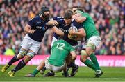 4 February 2017; Ross Ford of Scotland is tackled by Robbie Henshaw, left, and CJ Stander of Ireland during the RBS Six Nations Rugby Championship match between Scotland and Ireland at BT Murrayfield Stadium in Edinburgh, Scotland. Photo by Brendan Moran/Sportsfile