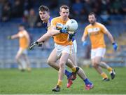 5 February 2017; Peter Healy of Antrim in action against Michael Quinlivan of Tipperary during the Allianz Football League Division 3 Round 1 match between Tipperary and Antrim at Semple Stadium in Thurles, Co. Tipperary. Photo by Matt Browne/Sportsfile