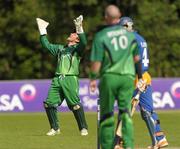 5 July 2011; Ireland wicket-keeper Gary Wilson, celebrates after Namibia batsman Christi Viljoen, was caught behind, to leave Namibia all out with 176 after 36 overs. One Day International, Ireland v Namibia, Stormont, Belfast, Co. Antrim. Photo by Sportsfile