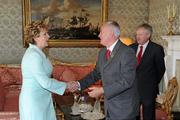 5 July 2011; President Mary McAleese greets Uachtarán Chumann Lúthchleas Gael Criostóir Ó Cuana and Ard Stiúrthóir of the GAA Páraic Duffy, right, on their arrival at Áras an Uachtaráin for a garden party for GAA Social Initiative participants. Áras an Uachtaráin, Phoenix Park, Dublin. Picture credit: Pat Murphy / SPORTSFILE