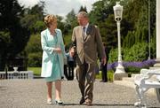 5 July 2011; President Mary McAleese with retired GAA commentator Michael O'Muircheartaigh at a garden party for GAA Social Initiative participants. Áras an Uachtaráin, Phoenix Park, Dublin. Picture credit: Pat Murphy / SPORTSFILE