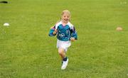 7 July 2011; Amber Whelan, age 6, in action during a GAA VHI Cúl Camp in Clonliffe College, Dublin. The camps, sponsored and subsidised by Croke Park and the GAA, catered for more than 150 local children from the Croke Park locality under the direction of camp co-ordinator Liam Ryan this week. Clonliffe College, Clonliffe Road, Dublin. Picture credit: Brendan Moran / SPORTSFILE