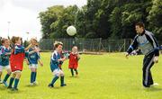 7 July 2011; Dublin hurler Alan Nolan throws the ball to restart a game during a GAA VHI Cúl Camp in Clonliffe College, Dublin. The camps, sponsored and subsidised by Croke Park and the GAA, catered for more than 150 local children from the Croke Park locality under the direction of camp co-ordinator Liam Ryan this week. Clonliffe College, Clonliffe Road, Dublin. Picture credit: Brendan Moran / SPORTSFILE