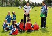 7 July 2011; Dublin hurler Liam Rushe and camp co-ordinator Liam Ryan, right, speak to a group of 6 year olds during a GAA VHI Cúl Camp in Clonliffe College, Dublin. The camps, sponsored and subsidised by Croke Park and the GAA, catered for more than 150 local children from the Croke Park locality under the direction of camp co-ordinator Liam Ryan this week. Clonliffe College, Clonliffe Road, Dublin. Picture credit: Brendan Moran / SPORTSFILE