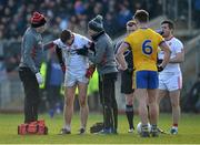 5 February 2017; Tyrone Doctor Damian O'Donnel, left, and Michael Harte Physiotherapistl checking Niall Sludden of Tyrone for concussion during the Allianz Football League Division 1 Round 1 match between Tyrone and Roscommon at Healy Park in Omagh, Co. Tyrone. Photo by Oliver McVeigh/Sportsfile