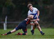 7 February 2017; Flynn Ashton of St Andrew’s College is tackled by Timothy Elliot of Wesley College during the Bank of Ireland Leinster Schools Junior Cup Round 1 match between Wesley College and St Andrew’s College at Anglesea Road in Dublin. Photo by Sam Barnes/Sportsfile