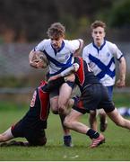 7 February 2017; Flynn Ashton of St Andrew’s College is tackled by Jack Atkinson, left, and Mattias Hjeseth of Wesley College during the Bank of Ireland Leinster Schools Junior Cup Round 1 match between Wesley College and St Andrew’s College at Anglesea Road in Dublin. Photo by Sam Barnes/Sportsfile