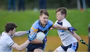 8 February 2017; Mick Fitsimons of UCD in action against Rory Brennan, left, and Mark Bradley of Ulster University during the Independent.ie HE GAA Sigerson Cup Quarter-Final match between Ulster University and UCD at Jordanstown in Belfast. Photo by Oliver McVeigh/Sportsfile