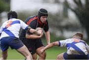 7 February 2017; Jamie Kavanagh of Wesley College is tackled by Alex Deegan, left and Daniel Molloy of St Andrew’s College during the Bank of Ireland Leinster Schools Junior Cup Round 1 match between Wesley College and St Andrew’s College at Anglesea Road in Dublin. Photo by Sam Barnes/Sportsfile