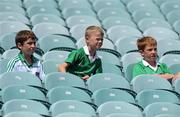 9 July 2011; Three young Limerick supporters watch on during the game. GAA Football All-Ireland Senior Championship Qualifier Round 2, Limerick v Offaly, Gaelic Grounds, Limerick. Picture credit: Diarmuid Greene / SPORTSFILE