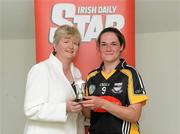 9 July 2011; President of the Camogie Association Joan Flynn presents Ann Dalton, Kilkenny, with the player of the match trophy. All Ireland Senior Camogie Championship in association with RTE Sport, Kilkenny v Clare, Nowlan Park, Kilkenny. Picture credit: Matt Browne / SPORTSFILE