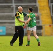 9 July 2011; Leitrim manager Mickey Moran shakes hands with Colm Clarke as he leaves the field. GAA Football All-Ireland Senior Championship Qualifier Round 2, Down v Leitrim, Pairc Esler, Newry, Co. Down. Picture credit: Oliver McVeigh / SPORTSFILE