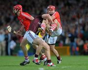 9 July 2011; Joe Canning, Galway, and Eoin Cadogan, Cork, tussle off the ball during the game. GAA Hurling All-Ireland Senior Championship Phase 3, Cork v Galway, Gaelic Grounds, Limerick. Picture credit: Diarmuid Greene / SPORTSFILE