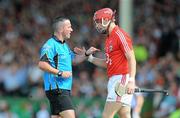 9 July 2011; Referee James McGrath speaks to Eoin Cadogan, Cork, during the game. GAA Hurling All-Ireland Senior Championship Phase 3, Cork v Galway, Gaelic Grounds, Limerick. Picture credit: Diarmuid Greene / SPORTSFILE