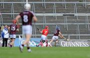 9 July 2011; Damien Hayes, Galway, scores his side's first goal despite the efforts of Cork's Donal Óg Cusack and Shane O'Neill. GAA Hurling All-Ireland Senior Championship Phase 3, Cork v Galway, Gaelic Grounds, Limerick. Picture credit: Diarmuid Greene / SPORTSFILE