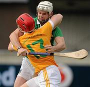 9 July 2011; Conor McCann, Antrim, is tackled by Tom Condon, Limerick. GAA Hurling All-Ireland Senior Championship Phase 3, Antrim v Limerick, Parnell Park, Dublin. Picture credit: Ray McManus / SPORTSFILE