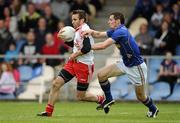 9 July 2011; Mark Donnelly, Tyrone, in action against Barry Gilleran, Longford. GAA Football All-Ireland Senior Championship Qualifier Round 2, Longford v Tyrone, Pearse Park, Co. Longford. Picture credit: Brendan Moran / SPORTSFILE