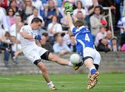 9 July 2011; Eamonn Callaghan, Kildare, shoots to score a point despite the challenge of Mark Timmons, Laois. GAA Football All-Ireland Senior Championship Qualifier Round 2, Laois v Kildare, O'Moore Park, Portlaoise, Co. Laois. Picture credit: Matt Browne / SPORTSFILE