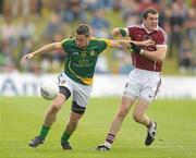 9 July 2011; Cian Ward, Meath, in action against Johnny Duane, Galway. GAA Football All-Ireland Senior Championship Qualifier Round 2, Meath v Galway, Pairc Tailteann, Navan, Co. Meath. Photo by Sportsfile
