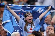 10 July 2011; A Dublin fan celebrates a score during the senior final at the Leinster GAA Football Championship Finals. Croke Park, Dublin. Picture credit: Brian Lawless / SPORTSFILE