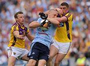 10 July 2011; Eoghan O'Gara, Dublin, in action against Joey Wadding and Niall Murphy, left, Wexford. Leinster GAA Football Senior Championship Final, Dublin v Wexford, Croke Park, Dublin. Picture credit: Brian Lawless / SPORTSFILE