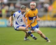 10 July 2011; Shane O'Donnell, Clare, in action against Jamie Barron, Waterford. Munster GAA Hurling Minor Championship Final, Clare v Waterford, Pairc Ui Chaoimh, Cork. Picture credit: Stephen McCarthy / SPORTSFILE
