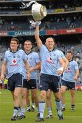 10 July 2011; Eoghan O'Gara, Dublin, celebrates with the Delaney Cup after the game. Leinster GAA Football Senior Championship Final, Dublin v Wexford, Croke Park, Dublin. Photo by Sportsfile