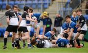 10 February 2017; JohnLuc Carvill of St Mary's College is tackled by Mark Dennis, left, and Donough Lawlor of Newbridge College during the Bank of Ireland Leinster Schools Junior Cup Round 1 match between Newbridge College and St Mary's College at Donnybrook Stadium in Donnybrook, Dublin. Photo by Daire Brennan/Sportsfile