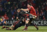 10 February 2017; Dave Kilcoyne of Munster is tackled by Brok Harris and Rynard Landman of Newport Gwent Dragons during the Guinness PRO12 Round 14 match between Munster and Newport Gwent Dragons at Irish Independent Park in Cork. Photo by Eóin Noonan/Sportsfile