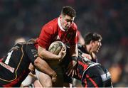 10 February 2017; Ronan O'Mahony of Munster is tackled by Sam Hobbs, left, and Nick Crosswell, right, of Newport Gwent Dragons during the Guinness PRO12 Round 14 match between Munster and Newport Gwent Dragons at Irish Independent Park in Cork. Photo by Eóin Noonan/Sportsfile
