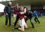 11 February 2017; Christopher Bradley of Slaughtneil is congratulated by supporters following his side's victory during the AIB GAA Football All-Ireland Senior Club Championship semi-final match between Slaughtneil and St Vincent's at Páirc Esler in Newry. Photo by Seb Daly/Sportsfile