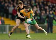 11 February 2017; Dylan Wall of Corofin in action against Gavin White of Dr. Crokes during the AIB GAA Football All-Ireland Senior Club Championship semi-final match between Corofin and Dr. Crokes at Gaelic Grounds in Limerick. Photo by Eóin Noonan/Sportsfile