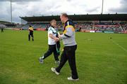 9 July 2011; Limerick manager Donal O'Grady and Antrim selector Ollie Baker greet each other before the game. GAA Hurling All-Ireland Senior Championship Phase 3, Antrim v Limerick, Parnell Park, Dublin. Picture credit: Ray McManus / SPORTSFILE