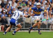 10 July 2011; Patrick Maher, Tipperary, in action against Tony Browne, Waterford. Munster GAA Hurling Senior Championship Final, Waterford v Tipperary, Pairc Ui Chaoimh, Cork. Picture credit: Stephen McCarthy / SPORTSFILE
