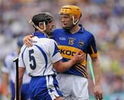 10 July 2011; Tony Browne, Waterford, with Tipperary's Lar Corbett after the game. Munster GAA Hurling Senior Championship Final, Waterford v Tipperary, Pairc Ui Chaoimh, Cork. Picture credit: Ray McManus / SPORTSFILE