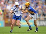 10 July 2011; Stephen Molumphy, Waterford, in action against Shane McGrath, Tipperary. Munster GAA Hurling Senior Championship Final, Waterford v Tipperary, Pairc Ui Chaoimh, Cork. Picture credit: Stephen McCarthy / SPORTSFILE
