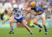 10 July 2011; Stephen Molumphy, Waterford, in action against Shane McGrath, Tipperary. Munster GAA Hurling Senior Championship Final, Waterford v Tipperary, Pairc Ui Chaoimh, Cork. Picture credit: Stephen McCarthy / SPORTSFILE