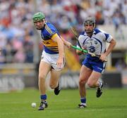 10 July 2011; Noel McGrath, Tipperary, in action against Tony Browne, Waterford. Munster GAA Hurling Senior Championship Final, Waterford v Tipperary, Pairc Ui Chaoimh, Cork. Picture credit: Ray McManus / SPORTSFILE