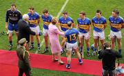10 July 2011; The President of Ireland Mary McAleese and Munster Chairman Sean Walsh are introduced to the Tipperary players by Eoin Kelly. Munster GAA Hurling Senior Championship Final, Waterford v Tipperary, Pairc Ui Chaoimh, Cork. Picture credit: Ray McManus / SPORTSFILE
