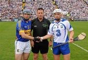 10 July 2011; Referee Brian Gavin with Tipperary captain Eoin Kelly, left, and Waterford captain Stephen Molumphy before the game. Munster GAA Hurling Senior Championship Final, Waterford v Tipperary, Pairc Ui Chaoimh, Cork. Picture credit: Diarmuid Greene / SPORTSFILE