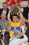10 July 2011; Clare captain Tony Kelly lifts the cup after victory over Waterford. Munster GAA Hurling Minor Championship Final, Clare v Waterford, Pairc Ui Chaoimh, Cork. Picture credit: Diarmuid Greene / SPORTSFILE