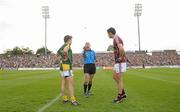 9 July 2011; Referee Michael Collins tosses the coin as Meath captain Seamus Kenny and Galway captain Finian Hanley look on. GAA Football All-Ireland Senior Championship Qualifier Round 2, Meath v Galway, Pairc Tailteann, Navan, Co. Meath. Photo by Sportsfile